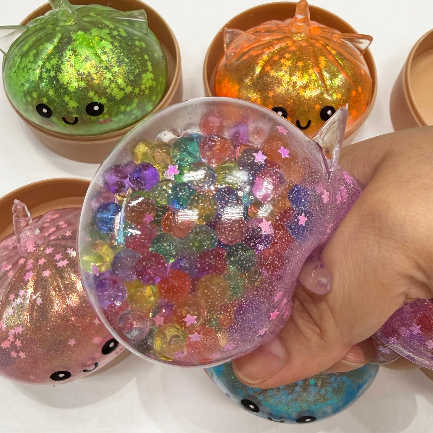 Squishy Unicorn Dumpling with Star Glitter and Colorful Beads